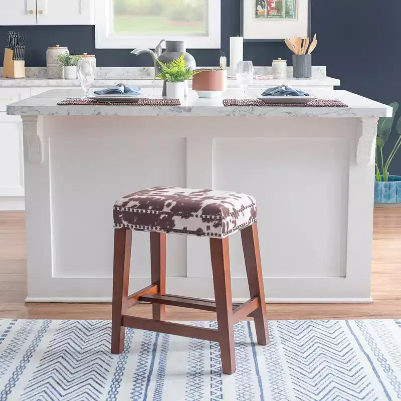 Tabouret de bar sans dossier, hauteur comptoir, rembourré avec clous décoratifs et repose-pieds